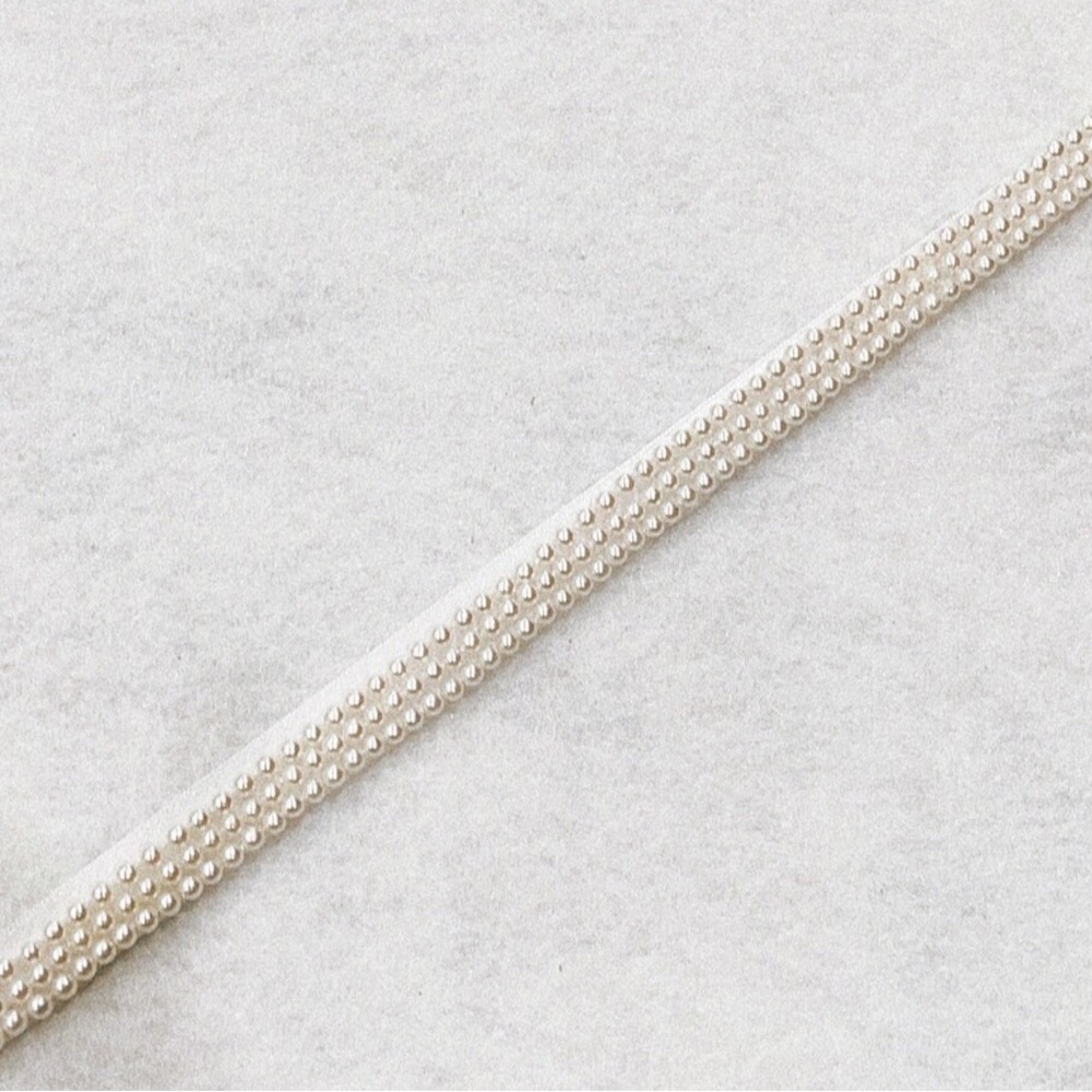 Pearl bridal sash with ribbon bow closure